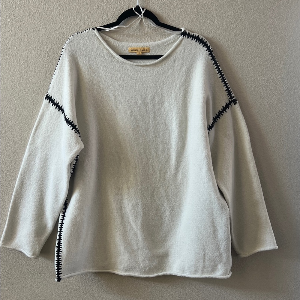 Chic White Sweater with Black Stitching